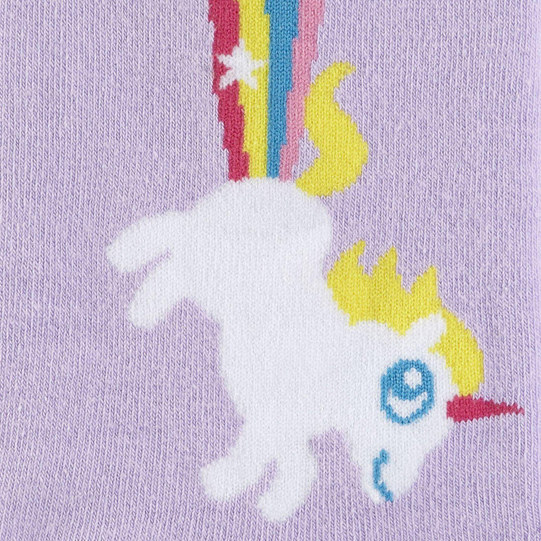 Close-up of a white unicorn launching a rainbow on a lavender sock
