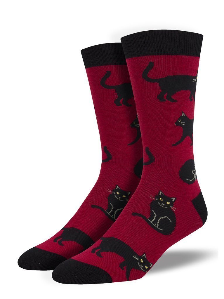 Men's burgundy crew socks covered in sleek black cats in various poses, with black cuffs and toes