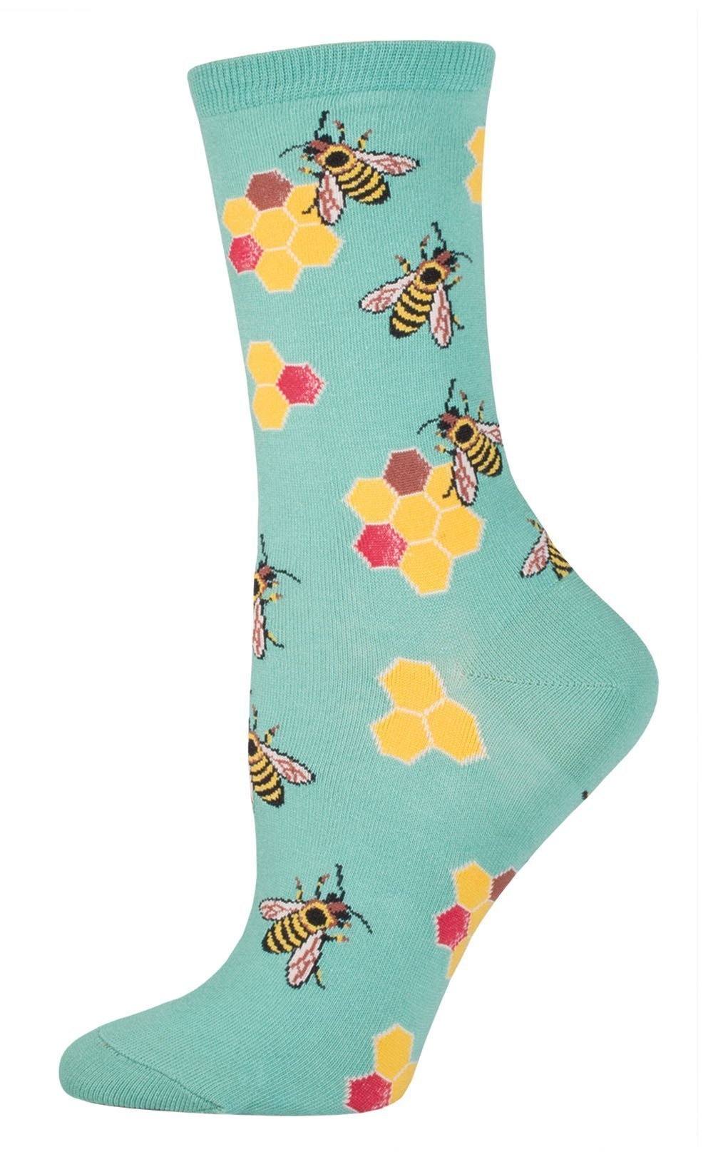 Mint green women's crew sock with striped honeybees and yellow and pink honeycomb cells