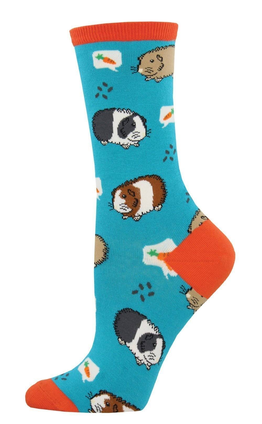 Women's guinea pig crew sock in teal blue with cavies, carrots and orange trim