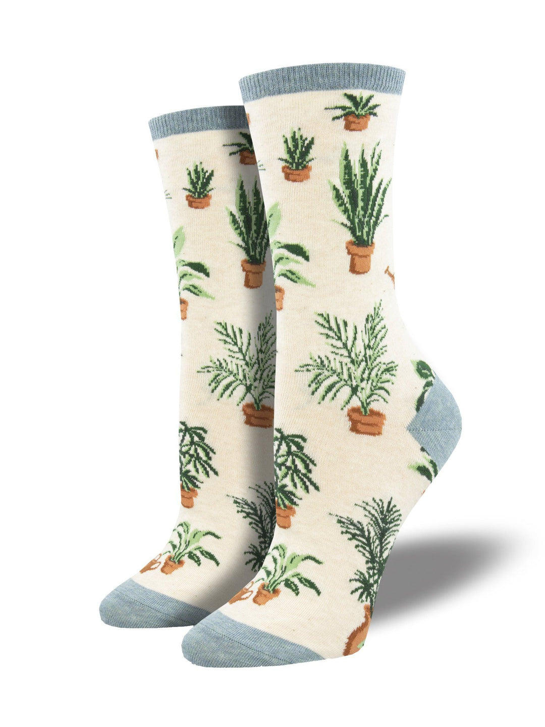 Women's cream crew socks on foot forms, patterned with potted houseplants and dusty-blue toes and cuffs
