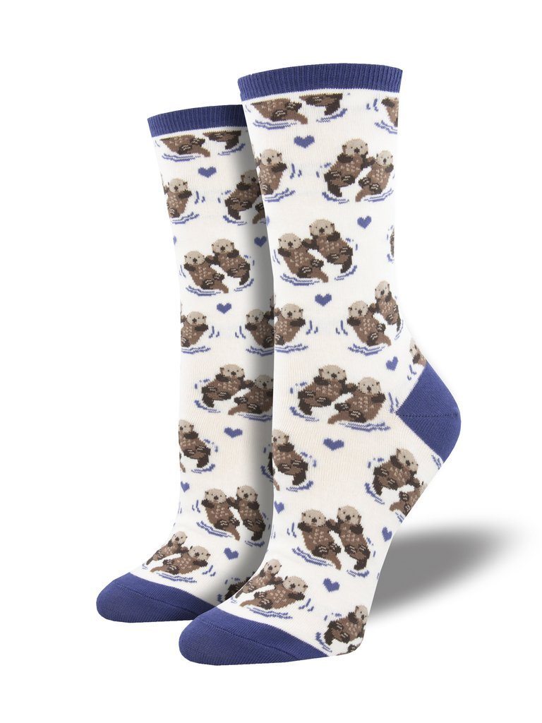Pair of cream sea otter crew socks with blue cuff, heel and toe