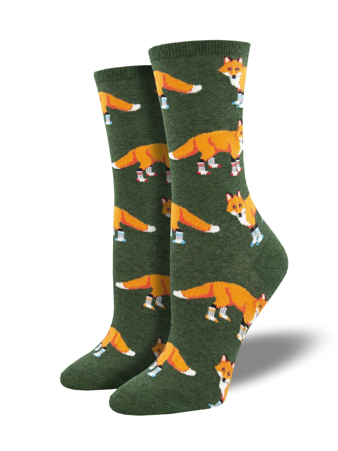 Women's green crew socks on foot forms, patterned with orange foxes wearing tiny striped socks