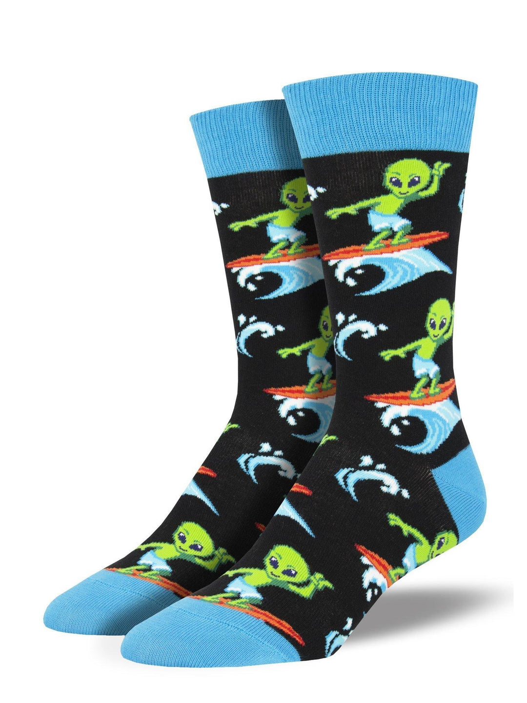 Men's black crew socks with green aliens surfing blue waves on orange boards, finished with bright blue cuffs and toes
