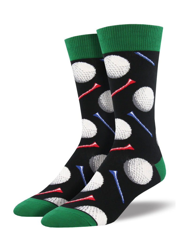 Pair of men's black crew socks covered in white golf balls and red and blue tees with green cuffs and toes