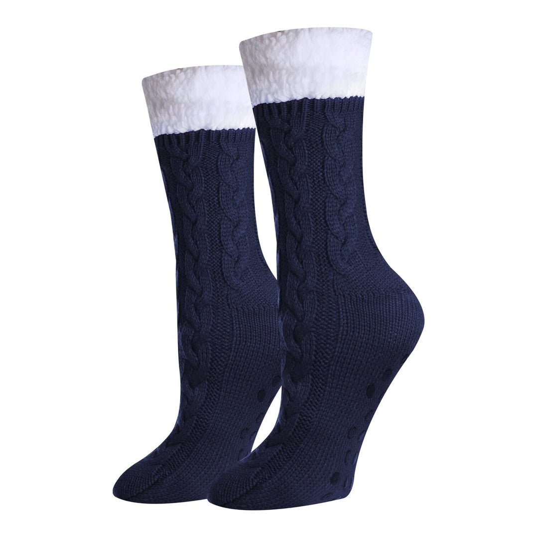 Women's solid navy sherpa-lined cable-knit crew socks, flat front view with cream fluffy cuff and gripped sole