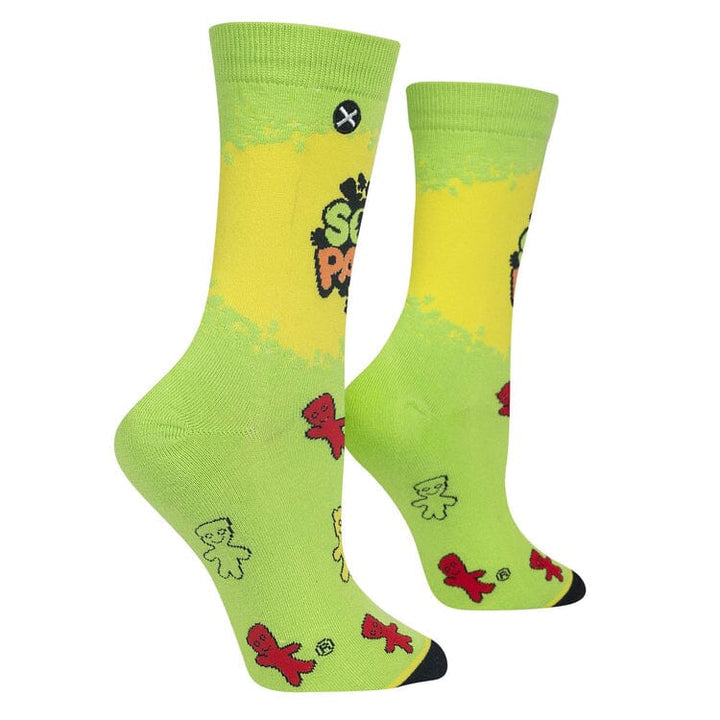 Side angle of the green Sour Patch Kids socks revealing more candy characters down the foot