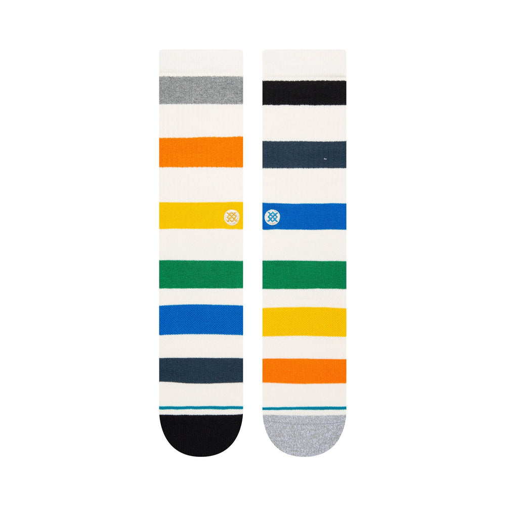 Flat-laid pair of the striped Amistad crew socks showing the front and back with multicolor bands and contrast toes