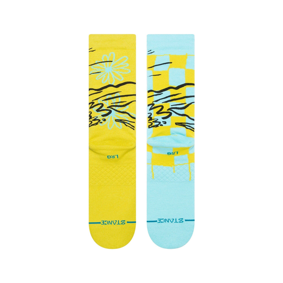 Reverse view of the yellow and aqua socks showing the back art and STANCE lettering near the toe
