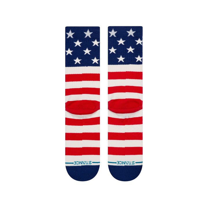 Bottom-sole view of the pair showing the lower stripe design and STANCE branding near the toe