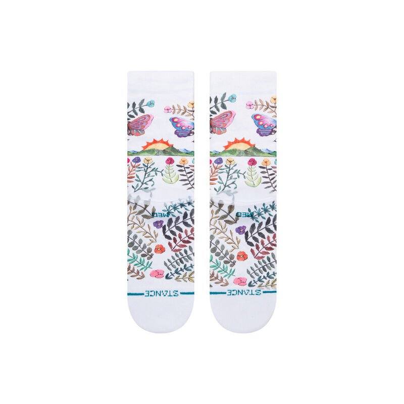 Side and back view of the garden of growth crew socks showing butterflies, sunrise and flowers