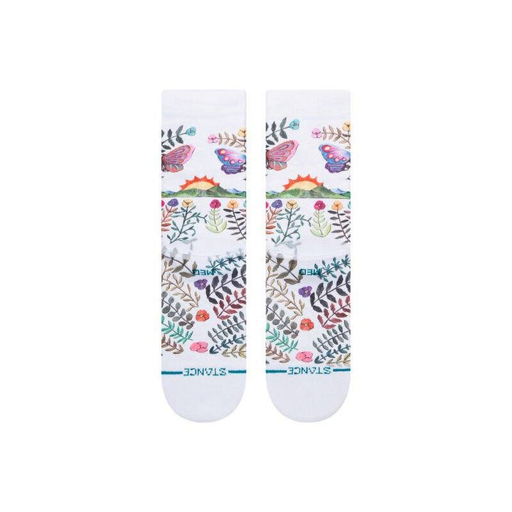 Side and back view of the garden of growth crew socks showing butterflies, sunrise and flowers