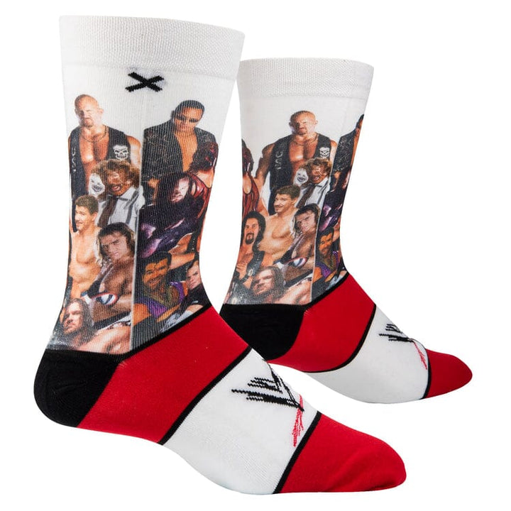 Front view of two WWE Attitude Era crew socks showing the wrestler group photo and red toes and heels