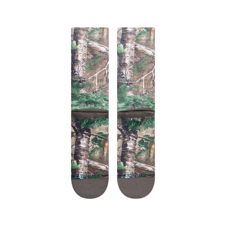 Reverse view of woodland camo crew socks showing the back print and gray toe
